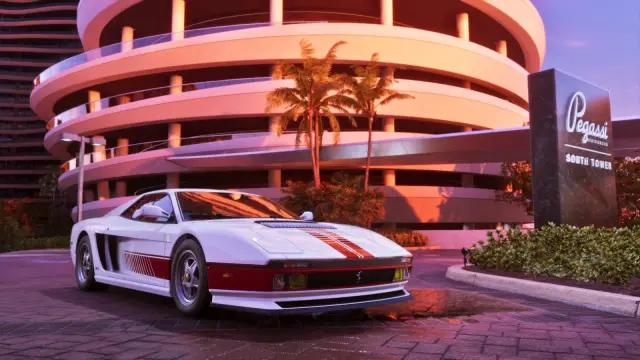 White GTA 6 Grotti Cheetah '95 with red stripes parked outside Pegassi South Tower
